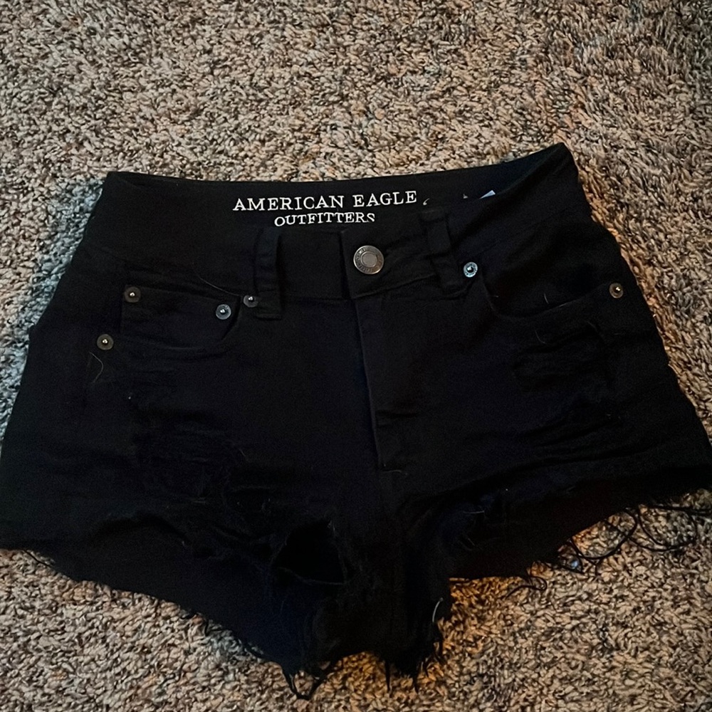 Black ripped shorts